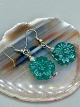 Load image into Gallery viewer, Upgrade your style with these sophisticated blue-green floral pressed glass earrings. Their iridescent glimmer finish adds a glamorous touch for any occasion. Crafted from lightweight glass, each design is both eye-catching and comfortable to wear. Measurements: 1 1/4&quot; length
