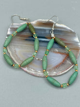 Load image into Gallery viewer, Crafted with exquisite detail, these Forest Green Magnesite Stone and Light Green and Gold Glass Beaded Fish Hook Earrings are perfect for any Hippie Vibe, Shabby Chic, Boho Chic, Nature Inspired, or Bohemian look. Measurements: 2 1/2&quot; length 
