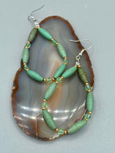 Load image into Gallery viewer, Crafted with exquisite detail, these Forest Green Magnesite Stone and Light Green and Gold Glass Beaded Fish Hook Earrings are perfect for any Hippie Vibe, Shabby Chic, Boho Chic, Nature Inspired, or Bohemian look.  Measurements: 2 1/2&quot; length 
