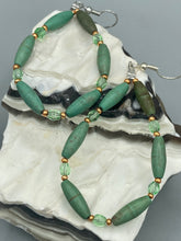 Load image into Gallery viewer, Crafted with exquisite detail, these Forest Green Magnesite Stone and Light Green and Gold Glass Beaded Fish Hook Earrings are perfect for any Hippie Vibe, Shabby Chic, Boho Chic, Nature Inspired, or Bohemian look.  Measurements: 2 1/2&quot; length 
