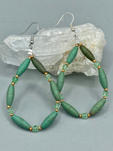 Load image into Gallery viewer, Crafted with exquisite detail, these Forest Green Magnesite Stone and Light Green and Gold Glass Beaded Fish Hook Earrings are perfect for any Hippie Vibe, Shabby Chic, Boho Chic, Nature Inspired, or Bohemian look. Measurements: 2 1/2&quot; length 
