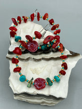 Load image into Gallery viewer, These Bamboo Coral Red Stone Chip earrings are complemented by turquoise and gold glass beading and a shimmery red pressed glass flower charm. The charm&#39;s iridescent shimmer finish has subtle hues of gold, purple, blue and pink.  Measurements: 2&quot; length
