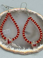 Load image into Gallery viewer, This pair of earrings contains intricately detailed koi-shaped glass beads, beaded along with dark red and gold glass beads. The koi fish beads feature fins and an eye, adding a visual element of realism to the piece. Perfect for creating a Hippie Vibe, Boho Chic, Nature Inspired, and Bohemian style.  Measurements: 2” in length   
