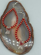 Load image into Gallery viewer, This pair of earrings contains intricately detailed koi-shaped glass beads, beaded along with dark red and gold glass beads. The koi fish beads feature fins and an eye, adding a visual element of realism to the piece. Perfect for creating a Hippie Vibe, Boho Chic, Nature Inspired, and Bohemian style.  Measurements: 2” in length   
