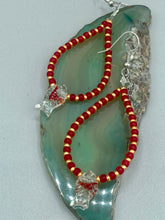 Load image into Gallery viewer, This pair of earrings contains intricately detailed koi-shaped glass beads, beaded along with dark red and gold glass beads. The koi fish beads feature fins and an eye, adding a visual element of realism to the piece. Perfect for creating a Hippie Vibe, Boho Chic, Nature Inspired, and Bohemian style.  Measurements: 2” in length   
