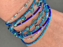 Load image into Gallery viewer, This Ocean Blue Waves Nine Stands Glass Beaded Chunky Wide Bracelet is the ideal accessory for any summer seaside look. Measurements: 8&quot; in length

